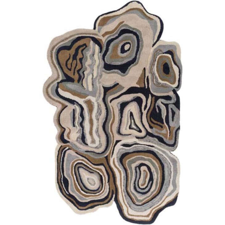 This New Rug Trend is the Easiest Way to Make Your Living Room More